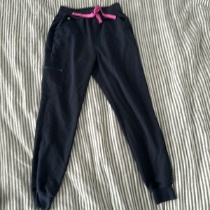 Figs high waist joggers color is a dark gray. Like new. Size S. Regular length.